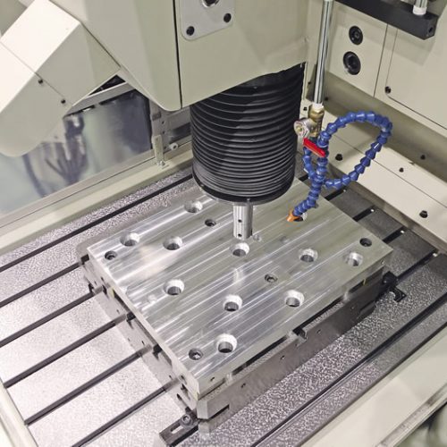 A jig borning machine with a hose attachment