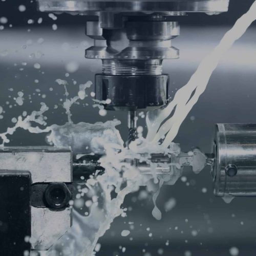 A CNC machine being cooled by water