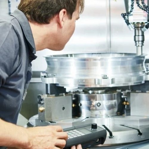 A man using a measuring machine