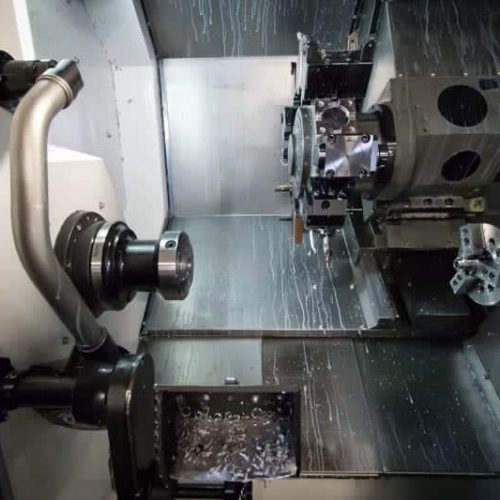A CNC milling machine waiting to operate