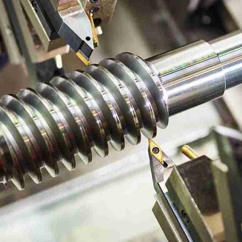 A gear cutter working on a spindle