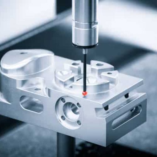 Operator inspection dimension metal parts by CMM after machining process in industrial factory image
