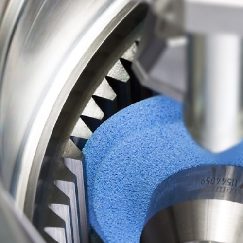 An internal grinding machine operating on a gear