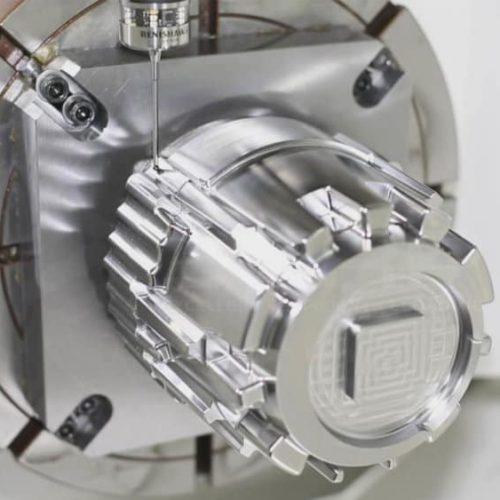 A machine part being measured by a sensitive piece of equipment