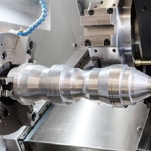 A CNC turning machine waiting to operate.