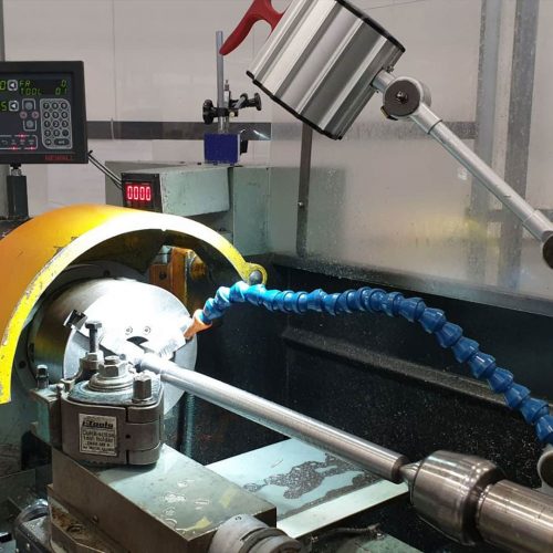 A manual turning machine with a hose attachment